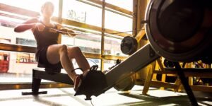 How Does Using a Rowing Machine Enhance Cardio and Strength?